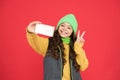 Merry christmas greeting. new year congratulations. happy teen girl making selfie with smartphone. xmas winter online