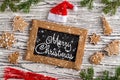 Merry Christmas greetings postcard with gingerbread cookie. Royalty Free Stock Photo