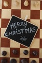 Merry Christmas hand drawn. Decoration. Chess Board. Chess pieces on board.. Gift cards Royalty Free Stock Photo