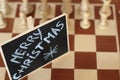 Merry Christmas hand drawn. Decoration. Sport. Chess board, pieces. Royalty Free Stock Photo