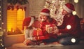 Merry Christmas! happy family mother father and child with magic Royalty Free Stock Photo