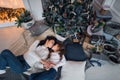 Merry Christmas and Happy Holidays. Cheerful mom and her cute daughter girl exchanging gifts. Parent and little child Royalty Free Stock Photo