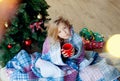 Merry Christmas and happy holidays!Christmas morning. happy child drinks cocoa