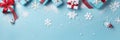 Merry Christmas and Happy Holidays greeting card, banner. Snowflakes and Christmas gifts on a blue background Royalty Free Stock Photo