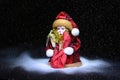 Merry Christmas and happy holidays. Santa Claus blows snow. Royalty Free Stock Photo
