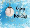 Merry Christmas and happy holidays wishes quotes  greeting card decoration white tree ball on blue background banner copy space Royalty Free Stock Photo