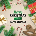 Merry Christmas and Happy New Year banner with gift box, candy stick, rocking horse, pine tree branch and holiday decor Royalty Free Stock Photo