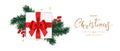 Merry Christmas and Happy new year banner. Gift box decorated with red bow, green pine branches, holly berry and star. Royalty Free Stock Photo