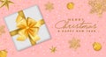 Merry Christmas and Happy New Year banner with realistic white gift box, golden snowflakes, stars xmas balls, and sparkles. Royalty Free Stock Photo