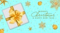 Merry Christmas and Happy New Year banner with realistic white gift box, golden snowflakes, stars xmas balls, and sparkles. Royalty Free Stock Photo