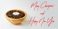 Merry Christmas and Happy New Year card with candle light in a wood cup with coffee beans. for season greetings concept Royalty Free Stock Photo