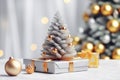 Merry Christmas and Happy New Year card decorated with bokeh: gifts under the Christmas tree Royalty Free Stock Photo