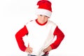 Merry christmas. Happy New Year. Caucasian young schoolboy in Santa costume. White background