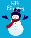 Merry christmas and happy new year. A cheerful snowman in mittens, a scarf and a hat on a blue background with the inscription. Royalty Free Stock Photo