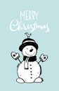 Merry christmas and happy new year. A cheerful snowman in mittens, a scarf and a hat on a blue background with the Royalty Free Stock Photo
