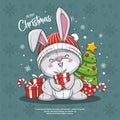 Merry Christmas And Happy New Year With Cute Little Rabbit Santa Claus Red Hat, Candy Cane, Gift Box And Christmas Tree. Season`s Royalty Free Stock Photo