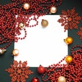 Merry Christmas and Happy New Year Decoration. Red and gold Bauble on Christmas black background. Winter time. Snowflake Royalty Free Stock Photo