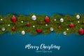 Merry Christmas and Happy New Year design concept. Fir tree branch decoration with glass balls and small stars on blue background. Royalty Free Stock Photo