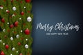 Merry Christmas and Happy New Year design concept. Fir tree branch decoration with glass balls and small stars on blue background. Royalty Free Stock Photo