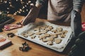Merry Christmas, Happy New Year. Festive gingerbread cookies cooking, baking Royalty Free Stock Photo