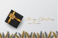 Merry Christmas and Happy New Year flyer or poster background. Gold and silver fir tree braches and black gift box. Simple style g Royalty Free Stock Photo