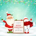 Merry Christmas. Happy new year. Funny Santa Claus with snowman holds wooden message board in Christmas snow scene Royalty Free Stock Photo