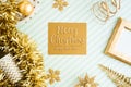 Merry christmas and happy new year gold greeting card view of sparkling gold tinsel,ball,ornament decorate on green strip line