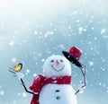 Merry christmas and happy new year greeting card with copy-space.Happy snowman standing in winter christmas landscape.Snow Royalty Free Stock Photo