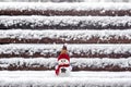 Merry christmas and happy new year greeting card with copy space Happy little snowman in red cap and scarf standing in winter snow Royalty Free Stock Photo