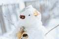 Merry Christmas and happy New Year greeting card with copy-space.Many snowmen standing in winter Christmas landscape. Royalty Free Stock Photo