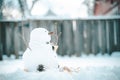 Merry Christmas and happy New Year greeting card with copy-space.Many snowmen standing in winter Christmas landscape.Winter backgr Royalty Free Stock Photo