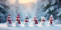 Merry Christmas and happy New Year greeting card with copy-space. Many snowmen standing in winter Christmas landscape