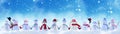 Merry Christmas and New Year greeting card with copy-space.Many snowmen standing in winter Christmas landscape.Winter Royalty Free Stock Photo