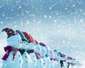 Christmas and New Year greeting card with copy-space.Many snowmen standing in winter Christmas landscape.Winter Royalty Free Stock Photo