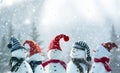 Merry Christmas and happy New Year greeting card with copy-space.Many snowmen standing in winter Christmas landscape.Winter Royalty Free Stock Photo