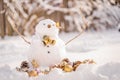 Merry Christmas and happy New Year greeting card with copy-space.Many snowmen standing in winter Christmas landscape. Royalty Free Stock Photo