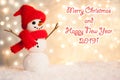 Merry christmas and happy new year greeting card with copy-space.Happy snowman standing in winter christmas landscape.Snow backgro Royalty Free Stock Photo