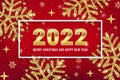 2022 Merry Christmas and Happy New Year greeting card design with golden date numbers, gold glitter snowflakes and shiny stars on Royalty Free Stock Photo