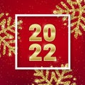 2022 Merry Christmas and Happy New Year greeting card design with shiny golden numbers and gold glitter snowflakes on Royalty Free Stock Photo