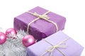 Merry Christmas and Happy New Year greeting card. Gift boxes with pink decorations on white background. Royalty Free Stock Photo