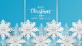 Merry christmas and happy new year greeting card, postcard with snowflake on blue background. Paper art style Royalty Free Stock Photo