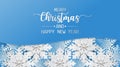Merry christmas greeting card, postcard with snowflake on blue background. Paper art style Royalty Free Stock Photo