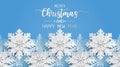 Merry christmas and happy new year greeting card with snowflake on blue background. Paper art style Royalty Free Stock Photo