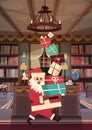 Merry Christmas And Happy New Year Greeting Card Santa Holding Present Stack Winter Holidays Concept Banner