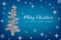 Merry Christmas and Happy New Year greeting card template. Hand drawn stylized Christmas tree with silver glitter effect on blue