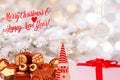 Merry Christmas and Happy New Year greeting card. Various chocolate candies sweets, a cute winter snowman and a gift package on Royalty Free Stock Photo