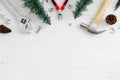 Merry Christmas and Happy new year handy tools and Christmas ornaments decoration on grunge white wood background concept. Top vi Royalty Free Stock Photo