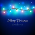 Merry Christmas and happy new year holiday greeting card. Colourful christmas lights. Glowing xmas garland. Glowing lights on blue Royalty Free Stock Photo