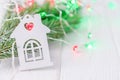 Merry Christmas and Happy New Year. A hut with a red heart on a white background Royalty Free Stock Photo