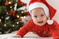 Merry christmas christmas and happy new year, infants, childhood, holidays concept - close-up 6 month old newborn Royalty Free Stock Photo